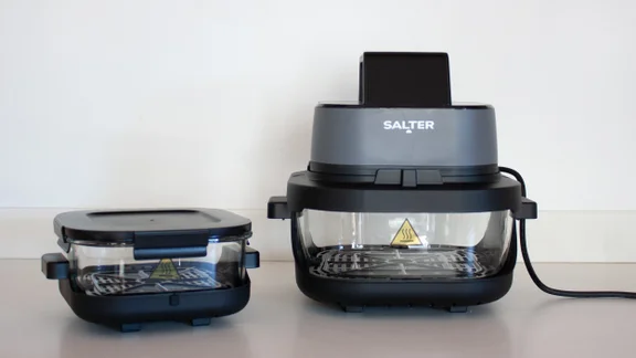 The Salter Crisp & Go air fryer, and its smaller dish, on a kitchen counter