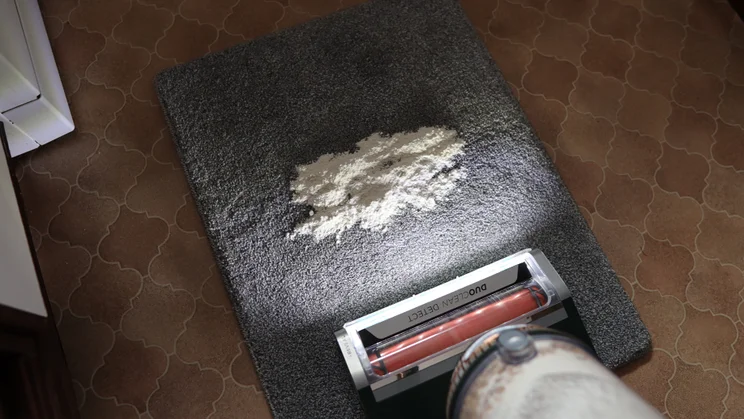 Shark PowerDetect Transformer cleaning flour on carpet
