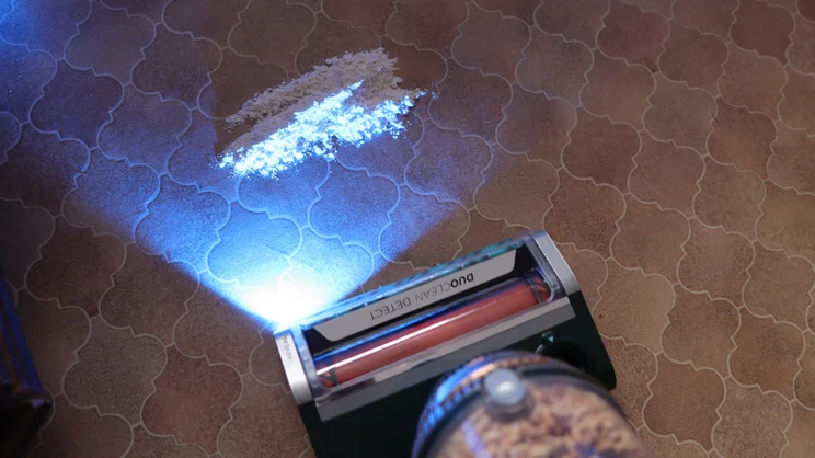 Shark PowerDetect Transformer cleaning flour on hard floor