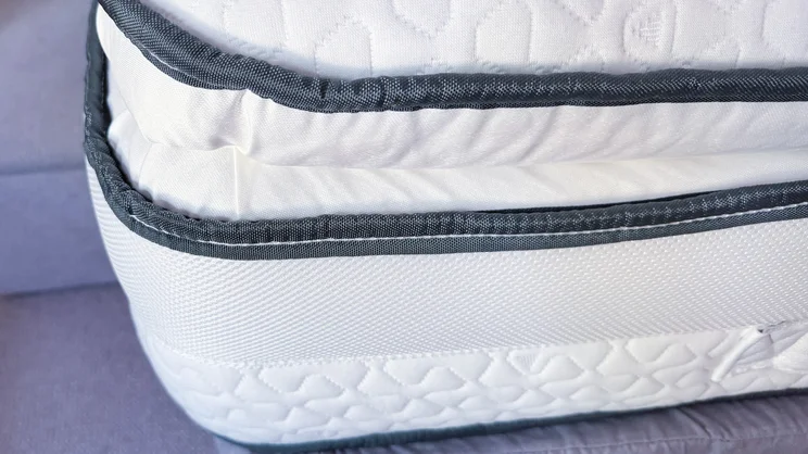 A closeup of a corner of the Silentnight UltraGel Miracoil Pillowtop mattress
