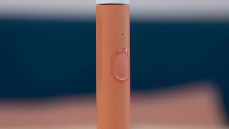 A closeup of the Suri Core 1.0 electric toothbrush's body