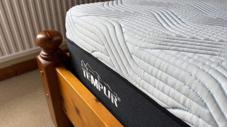 A closeup of the Tempur Pro Plus SmartCool mattress' corner and logo