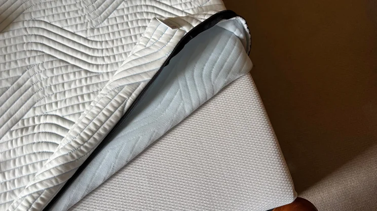 A bird's eye view of the Tempur Pro Plus SmartCool mattress, its top cover partially removed