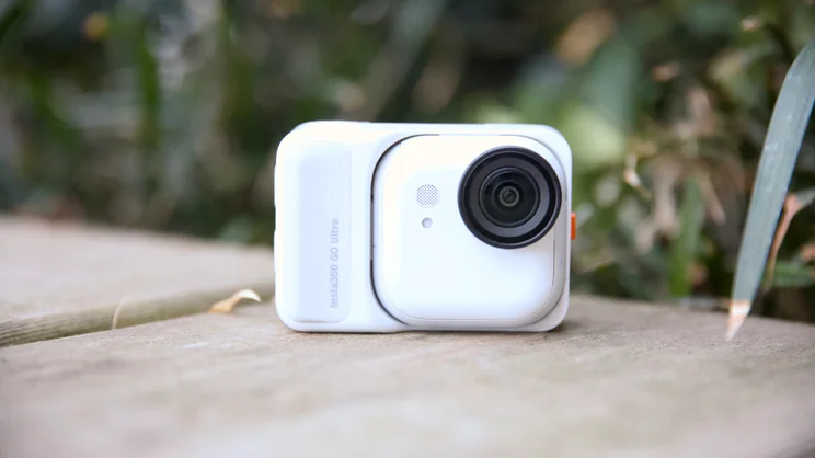 The Insta360 Go Ultra pictured from the front in its dock
