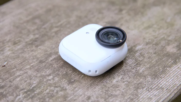 The Insta360 Go Ultra pictured laid on its back on a bench