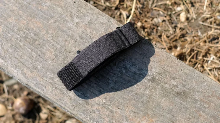 The Garmin Cirqa tracker's trap lying on a wooden bench