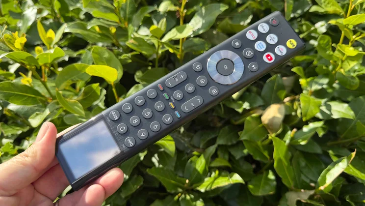 The remote control included with the Hisense UR9S RGB Mini LED TV