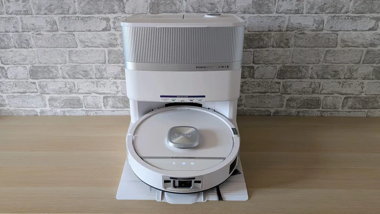 The Shark PowerDetect UV Reveal 2-in-1 robot vacuum docked in its docking station
