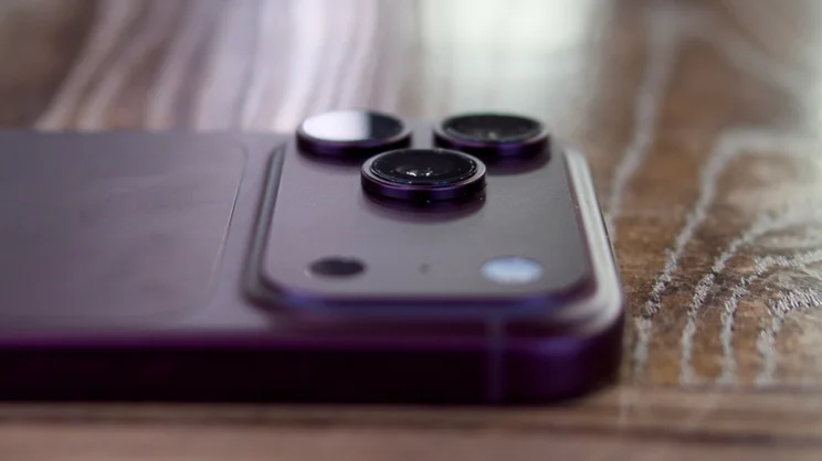 Apple iPhone 18 Pro Max camera housing shot from the side on a wood worktop