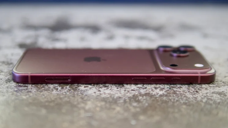 Apple iPhone 18 Pro Max pictured from the side on a concrete worktop