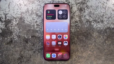 Apple iPhone 18 Pro Max straight up, shot on a concrete worktop