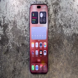 Apple iPhone 18 Pro Max straight up, shot on a concrete worktop