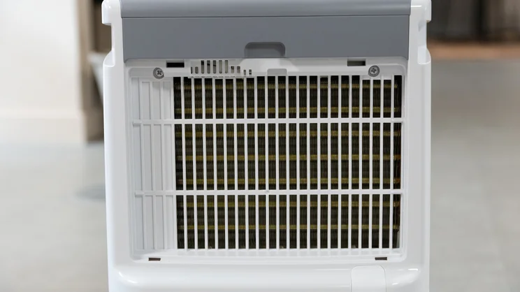 A rear view of the Devola DVH12L Compressor dehumidifier, with filter cover removed
