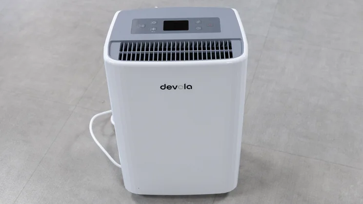A bird's eye view of the Devola DVH12L Compressor dehumidifier, on the floor of an office