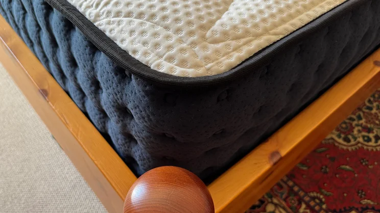 A closeup of the DreamCloud Hybrid mattress' corner