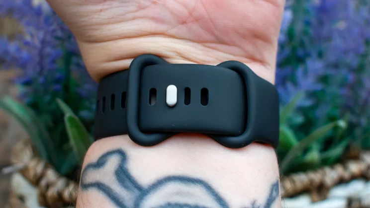 Google Pixel Watch 5 on wrist, showing the strap and clasp