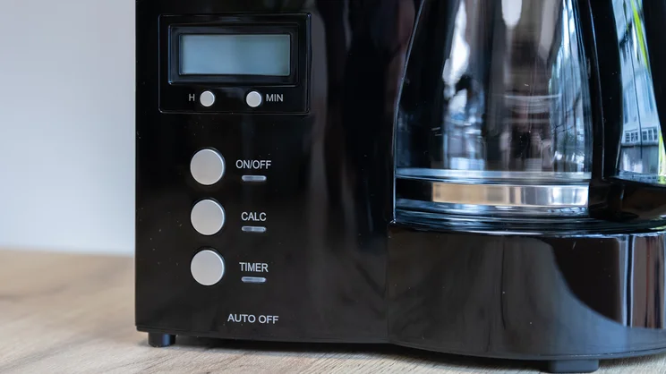 A closeup of the Melitta Optima Timer filter coffee machine's control panel
