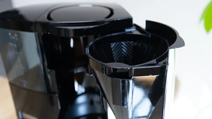 A closeup of the Melitta Optima Timer filter coffee machine's filter compartment