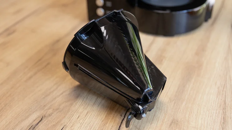 A closeup of the Melitta Optima Timer filter coffee machine's filter cone, removed from the machine