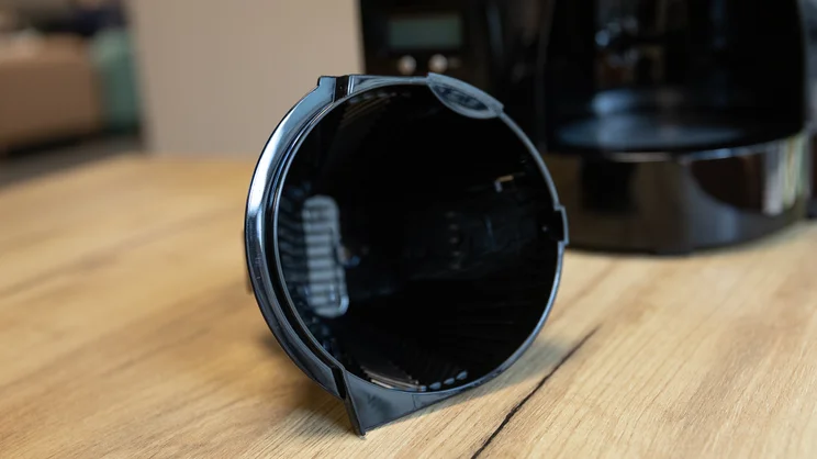 A closeup of the Melitta Optima Timer filter coffee machine's filter cone, removed from the machine