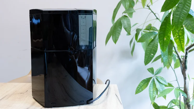 A rear view of the Melitta Optima Timer filter coffee machine, on a table