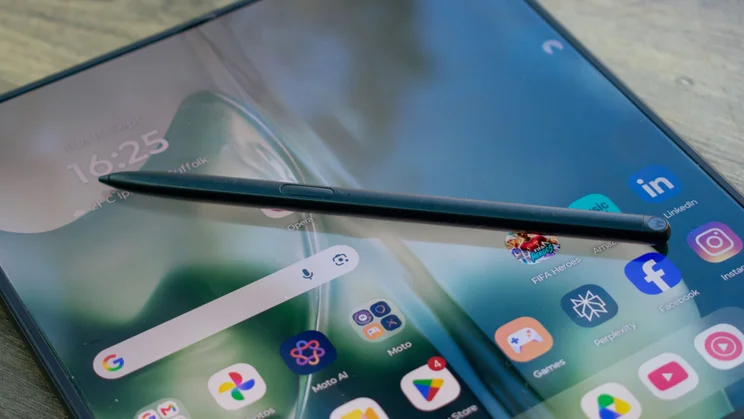 Moto Pen Ultra lying on the Motorola Razr Fold's display