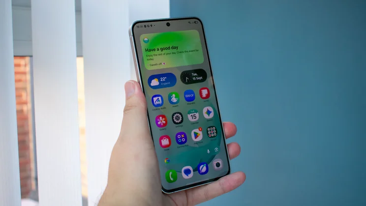Samsung Galaxy S26 FE in hand, front view