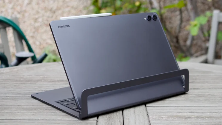 Low-angle view of the Samsung Galaxy Tab S12 Ultra's back corner with its two camera lenses, a speaker grille and the edge of the stylus.