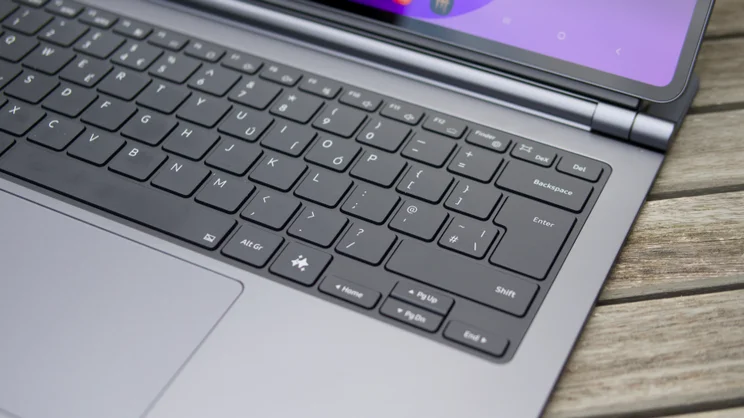 UK-layout keyboard cover for the Samsung Galaxy Tab S12 Ultra, showing Enter, Backspace, Shift, a sparkle-icon key beside Alt Gr and part of the trackpad