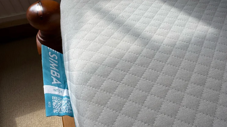 A closeup of the Simba Simbatex Cool mattress' surface and label