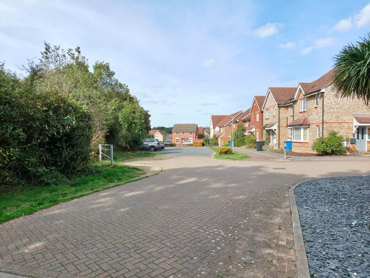 Close of houses with trees on the left side