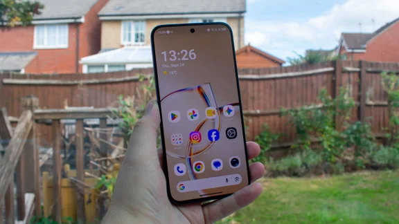 TCL P80 Ultra in hand, front view