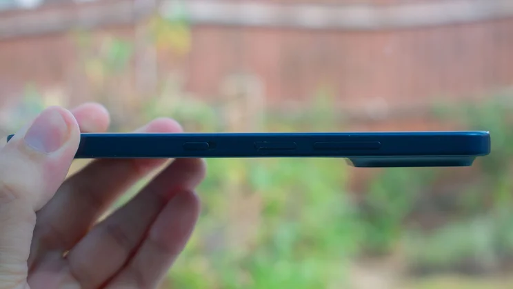 TCL P80 Ultra in hand, right edge