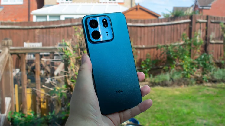 TCL P80 Ultra in hand, rear view
