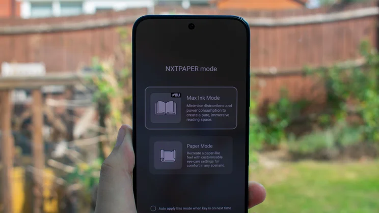 TCL P80 Ultra in hand, displaying Nxtpaper options