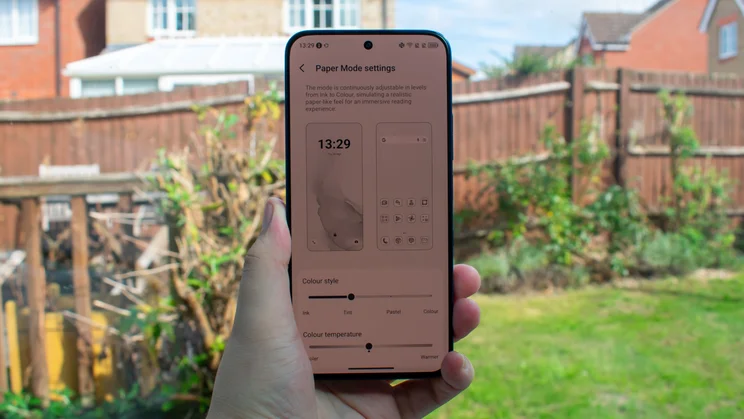 TCL P80 Ultra in hand, displaying e-reader settings