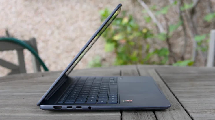 The Asus Zenbook 14 (2026), half open, pictured from the left side