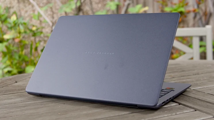 The Asus Zenbook 14 (2026), half open, pictured from the rear