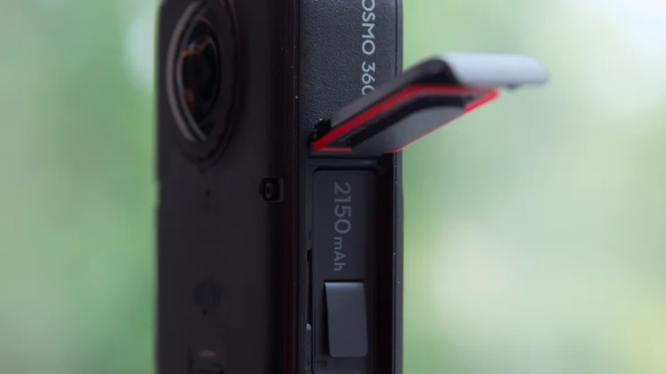 The DJI Osmo 360 II's battery flap, open