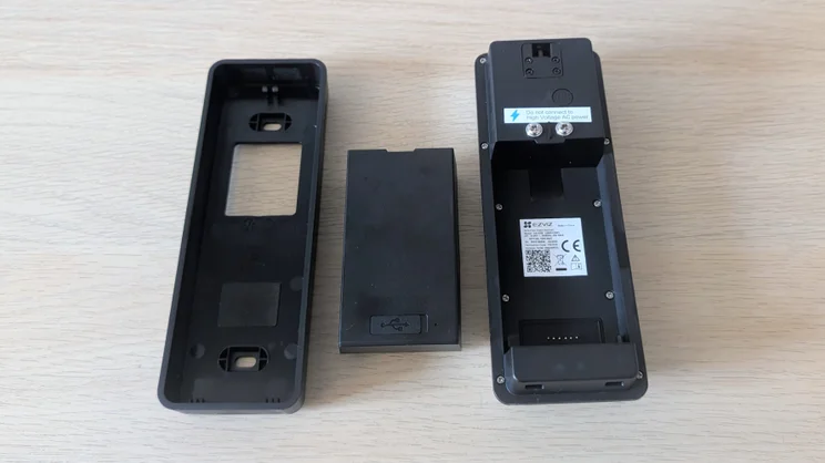 The Ezviz EP8 Ultra with mounting bracket and battery pictured from the rear