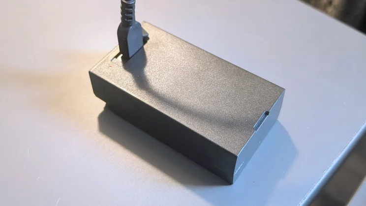 The Ezviz EP8 Ultra's spare battery charging separately
