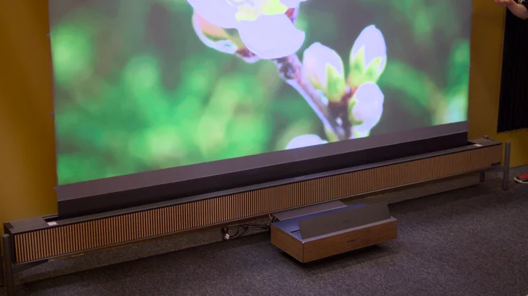 XGIMI Aura 3 Max projecting a 120in display