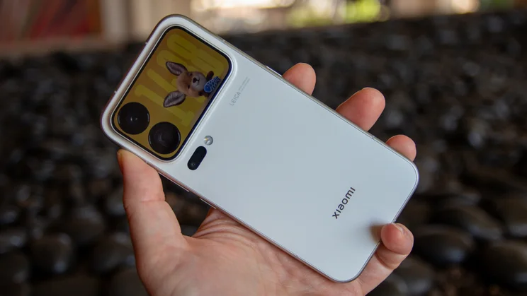 Xiaomi 18 Pro Max in hand, angled rear view