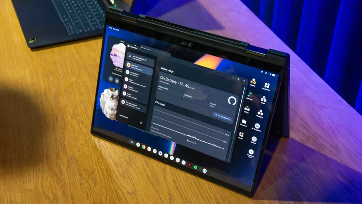 The Acer Googlebook 14 2-in-1 convertible laptop in tent mode on a wooden desk