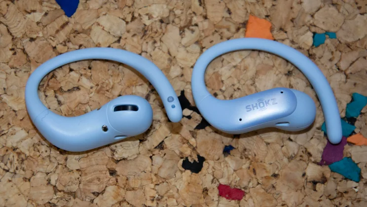 The earbuds of the Shokz OpenFit Air 2 side by side, one facing upwards, the other facing downwards