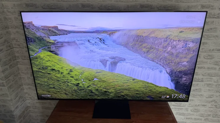 The Sony Bravia 9 II True RGB TV on a wooden table displaying a photo by Enxun Wei