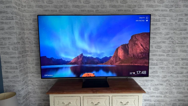 The Sony Bravia 9 II True RGB TV on a wooden table displaying a photo by Cliff Redeker