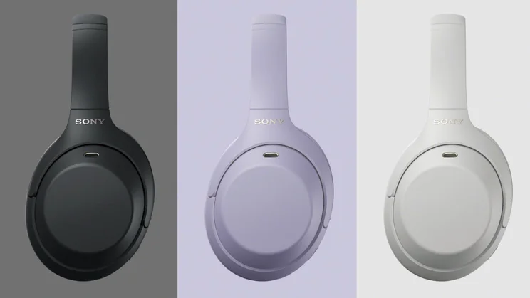 Three Sony WH-1000XM4C headphones in Black, Lavender and Silver