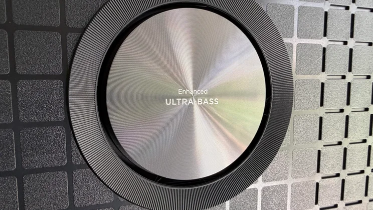 One of the subwoofers on the rear of the TCL C8L SQD Mini LED TV