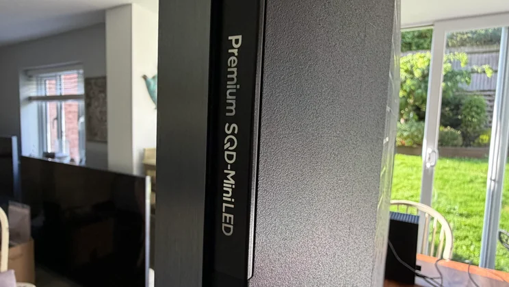The Premium SQD-Mini LED logo on the side of the panel of the TCL C8L TV